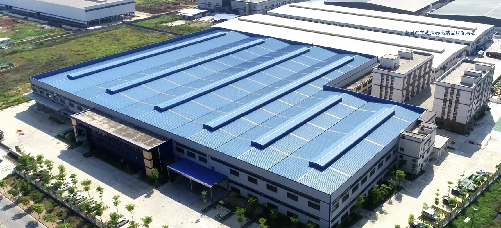 Blue industrial building aerial view